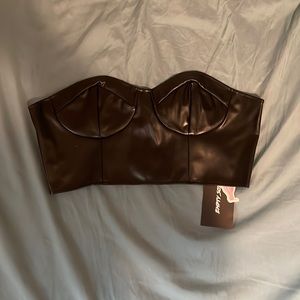 Empty soda crop leather top
